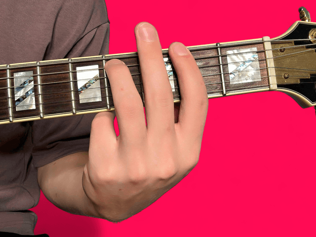 F#m7 guitar chord with finger positions