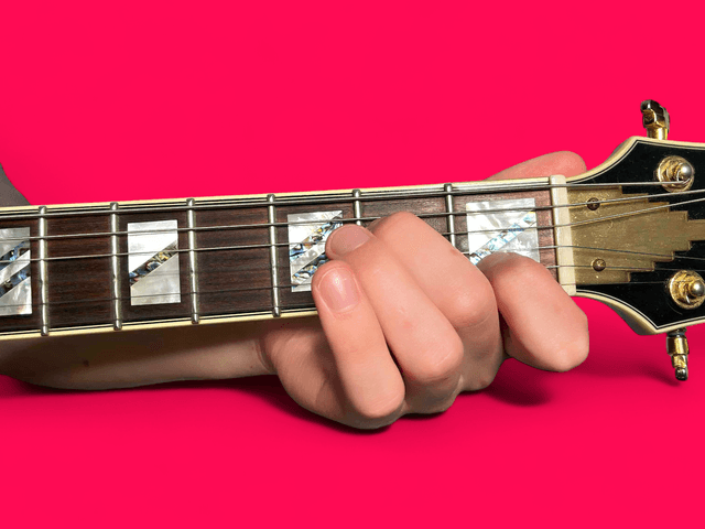 Am7 guitar chord with finger positions