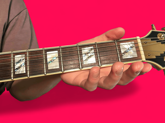 E minor over D guitar chord with finger positions