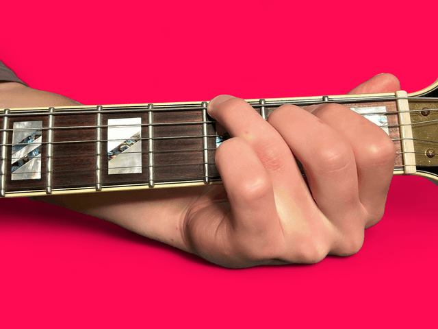 E minor over G guitar chord with finger positions