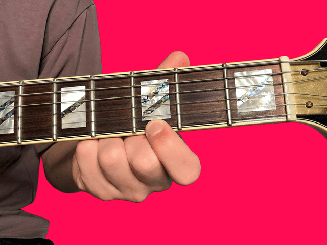 G major over D guitar chord with finger positions