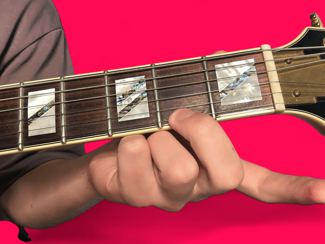 E major over B guitar chord with finger positions