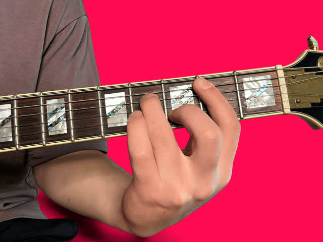 Bm7 guitar chord with finger positions